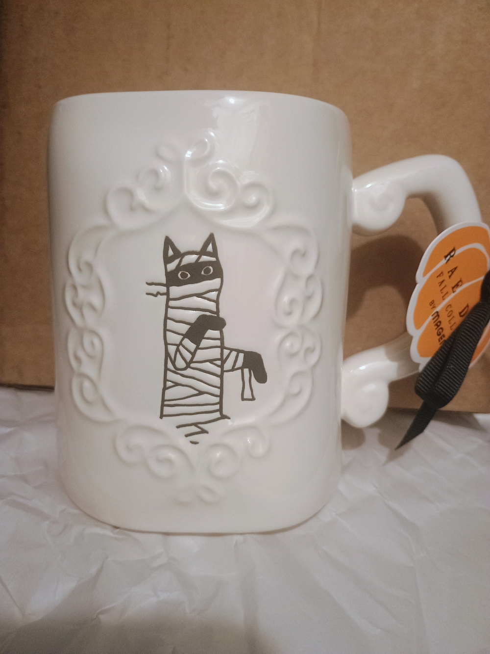 Rae Dunn White Ceramic Mug with Black Mummy Cat Graphic and Embossed Frame